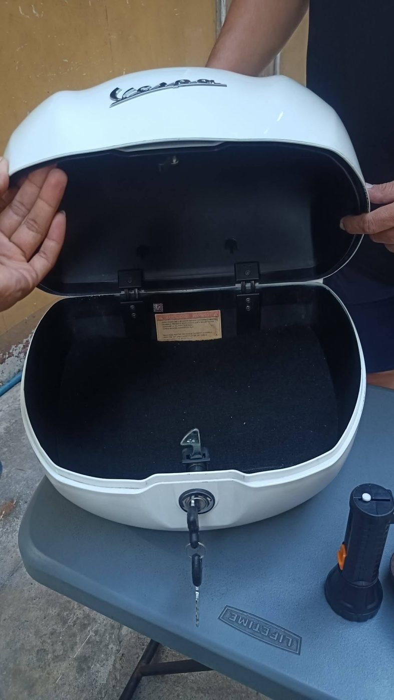 Vespa top case unlocked and key restored